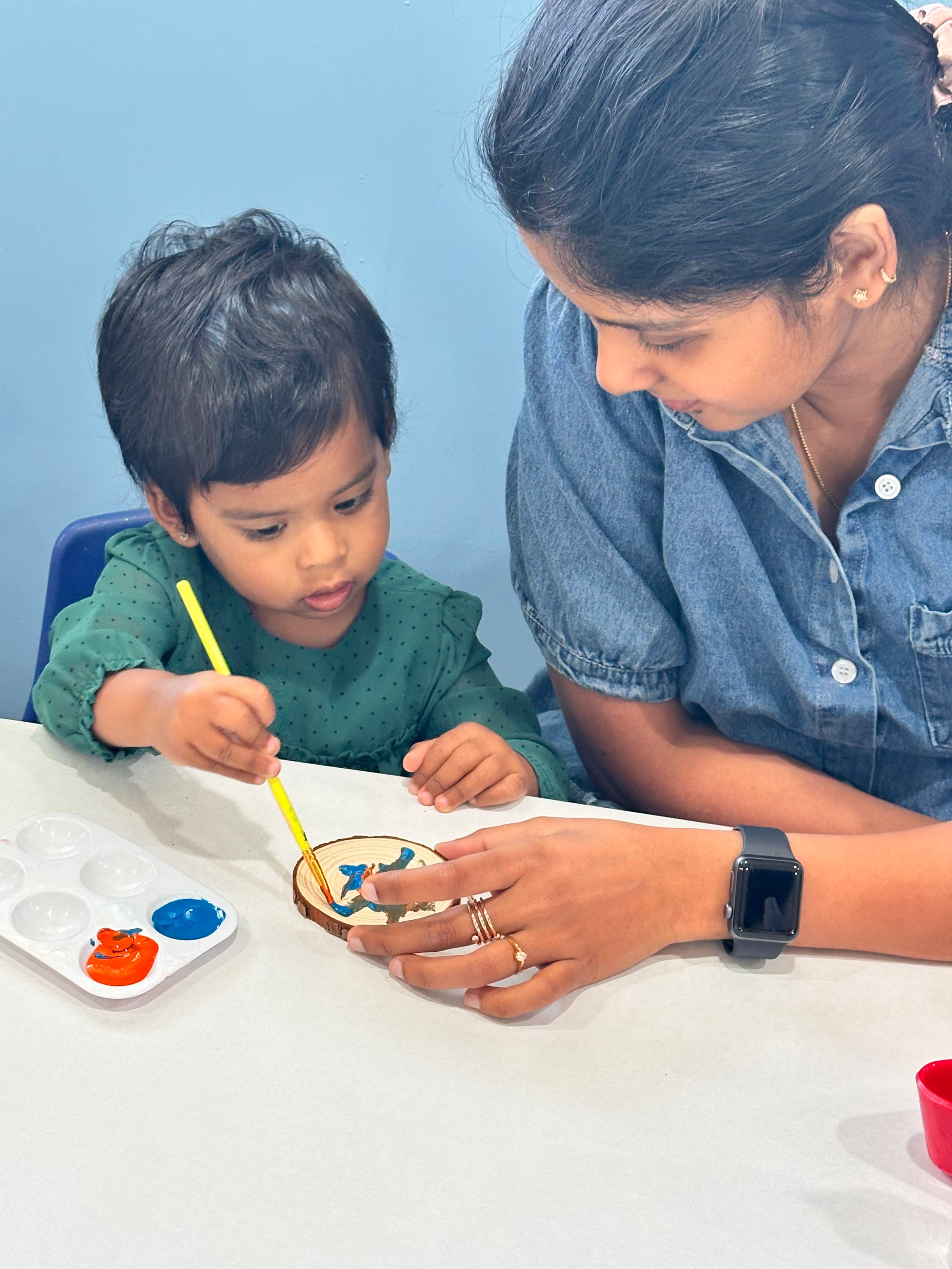 Child exploring Montessori materials